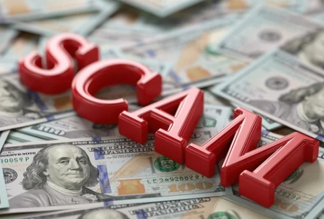 Letters spelling SCAM over dollar bills representing misrepresentation and omission