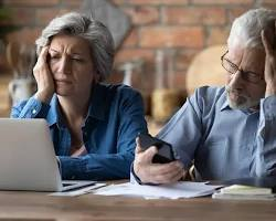 Couple reviewing unsuitable investment losses